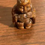 Vintage Hardwood Sculpture of Man with Musical Instrument – Handcrafted Wooden Art