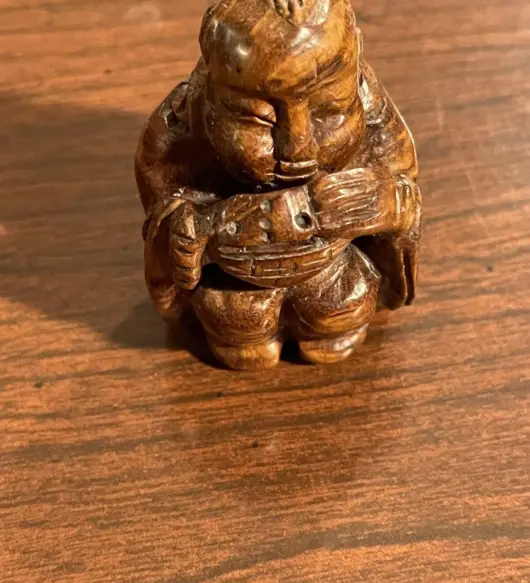 Vintage Hardwood Sculpture of Man with Musical Instrument – Handcrafted Wooden Art